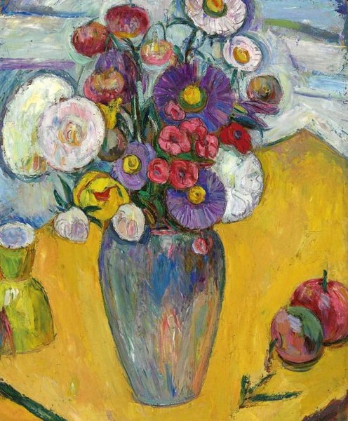 Flowers on a yellow table