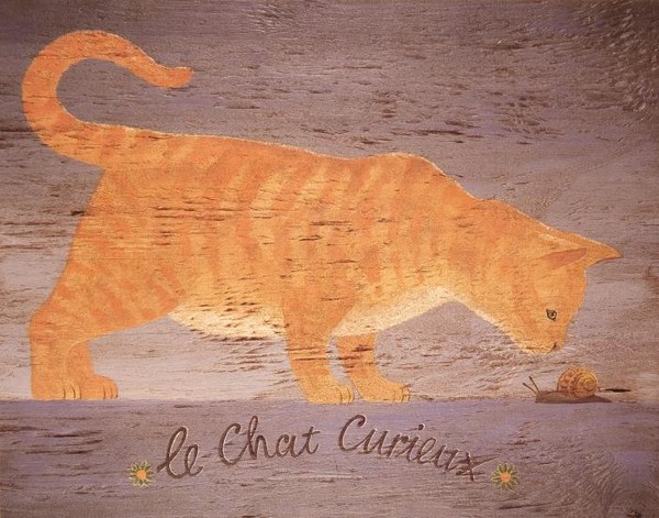 Le Chat Curieux